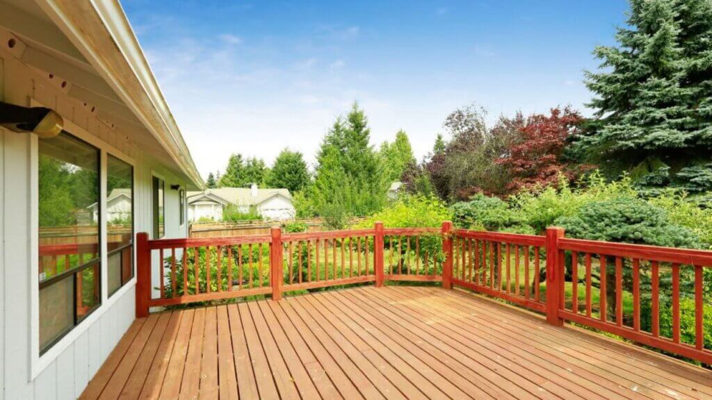 a house deck wit a beautiful garden.