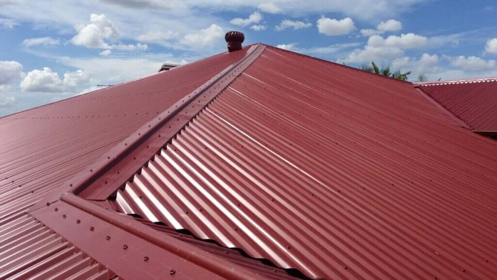 a metal roofing with the sky in the background.