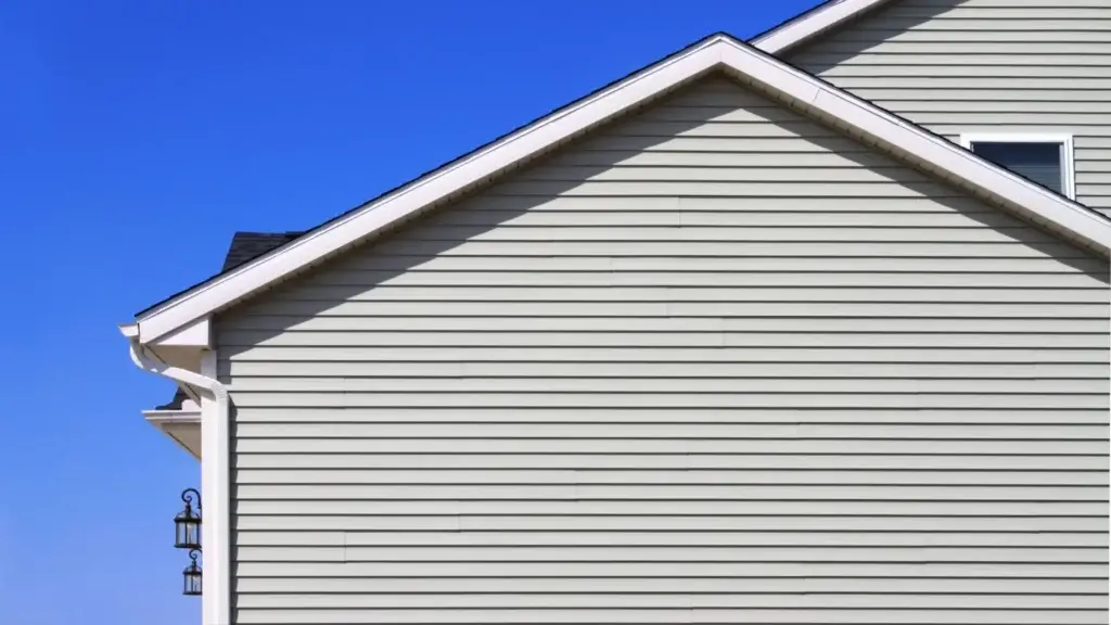 white vinyl siding of the side of a house.